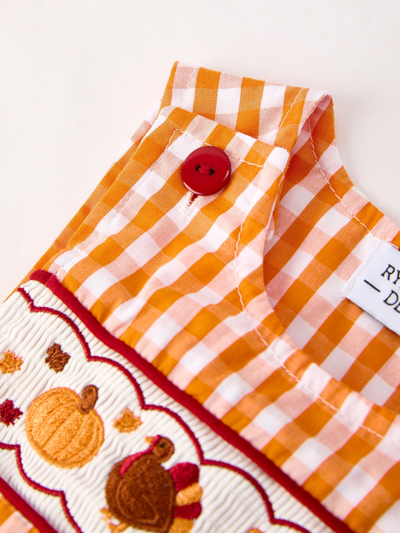 Fall Embroidered Romper for Baby Boys – Orange Checkered with Halloween Details