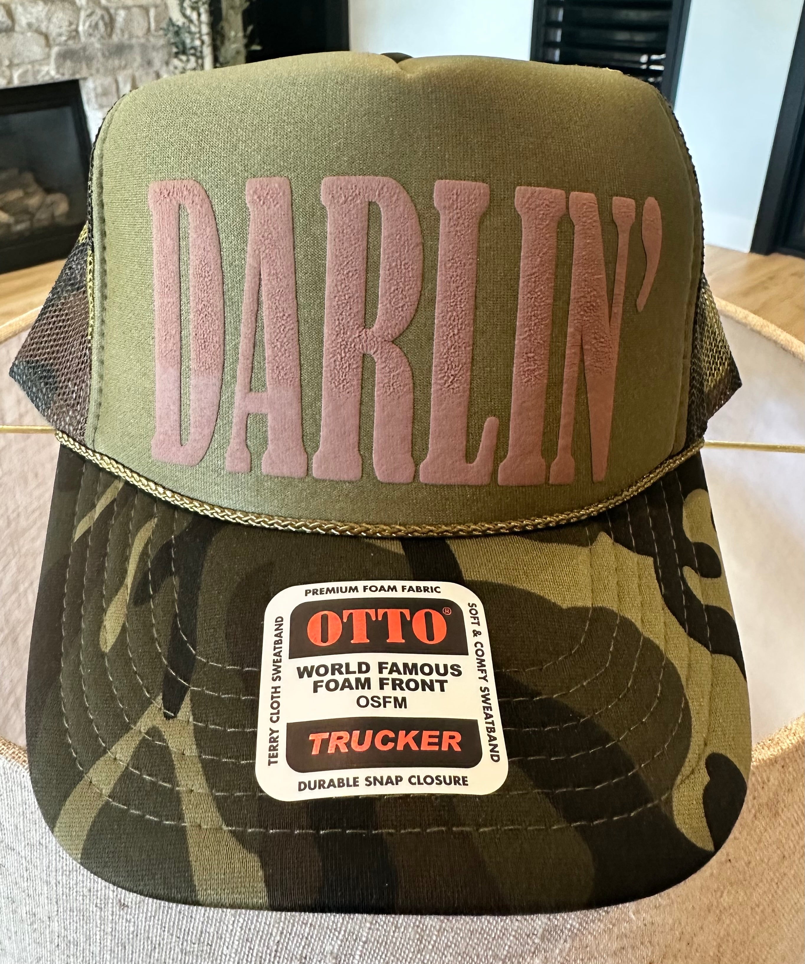 Darlin in Brown Puff Vinyl on camo and Olive Foam Trucker Hat