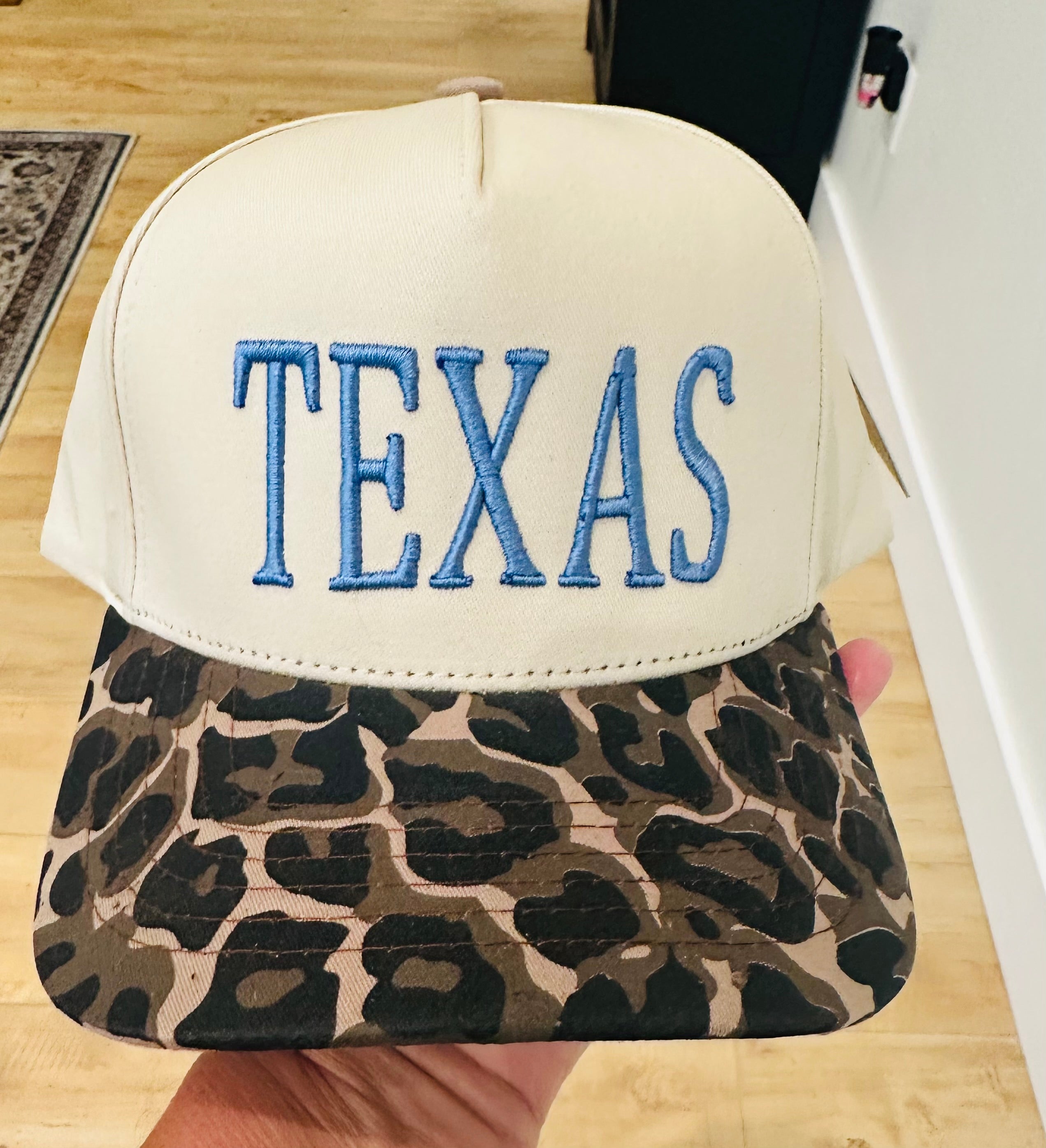 TEXAS Puff Embroidery in Dusty Blue on a natural and leopard hat