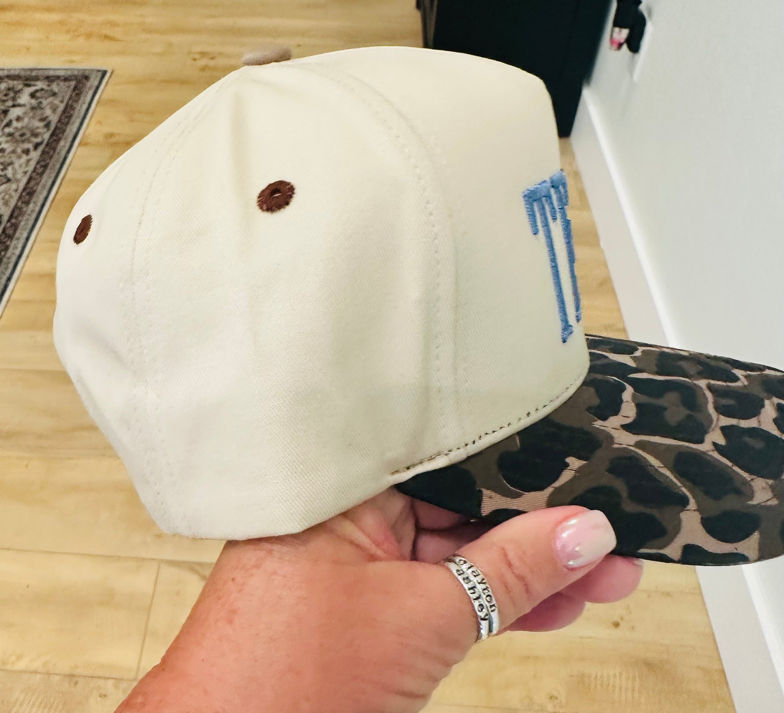 TEXAS Puff Embroidery in Dusty Blue on a natural and leopard hat