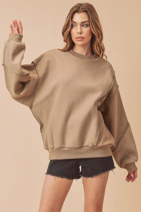 Aemi + Co Exposed Seam Round Neck Drop Shoulder Sweatshirt - S. M. & Co.