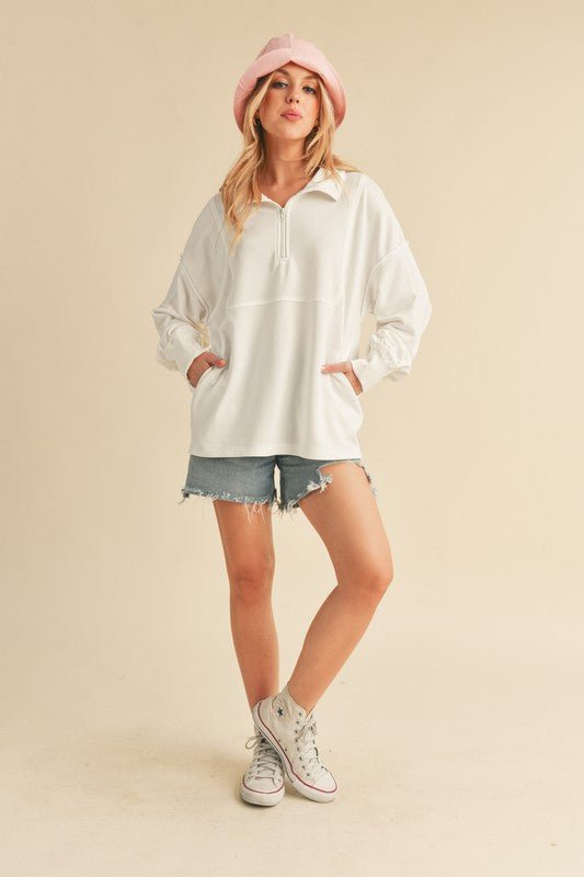 Aemi+Co Exposed Seam Half Zip Drop Shoulder Sweatshirt - S. M. & Co.