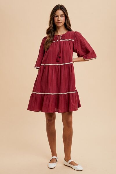 Annie Wear Tassel Contrast Trim Tie Neck Half Sleeve Tiered Dress - S. M. & Co.