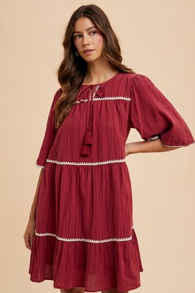 Annie Wear Tassel Contrast Trim Tie Neck Half Sleeve Tiered Dress - S. M. & Co.