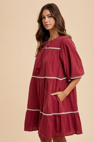 Annie Wear Tassel Contrast Trim Tie Neck Half Sleeve Tiered Dress - S. M. & Co.