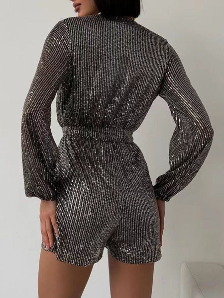 Full Size Sequin Surplice Tie Waist Long Sleeve Romper - S. M. & Co.