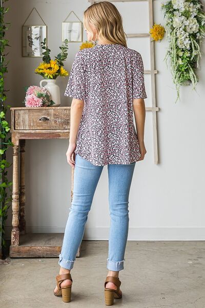 Heimish Full Size Short Sleeve Crisscross Animal Babydoll Top Plus Size - S. M. & Co.