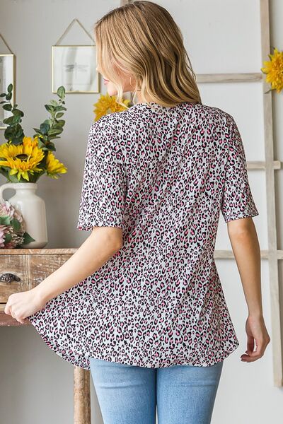 Heimish Full Size Short Sleeve Crisscross Animal Babydoll Top Plus Size - S. M. & Co.