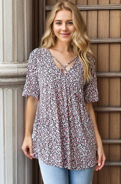 Heimish Full Size Short Sleeve Crisscross Animal Babydoll Top Plus Size - S. M. & Co.