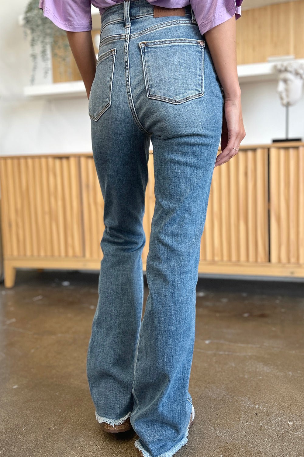 Judy Blue Full Size Distressed Raw Hem Bootcut Jeans - S. M. & Co. Denim Jeans