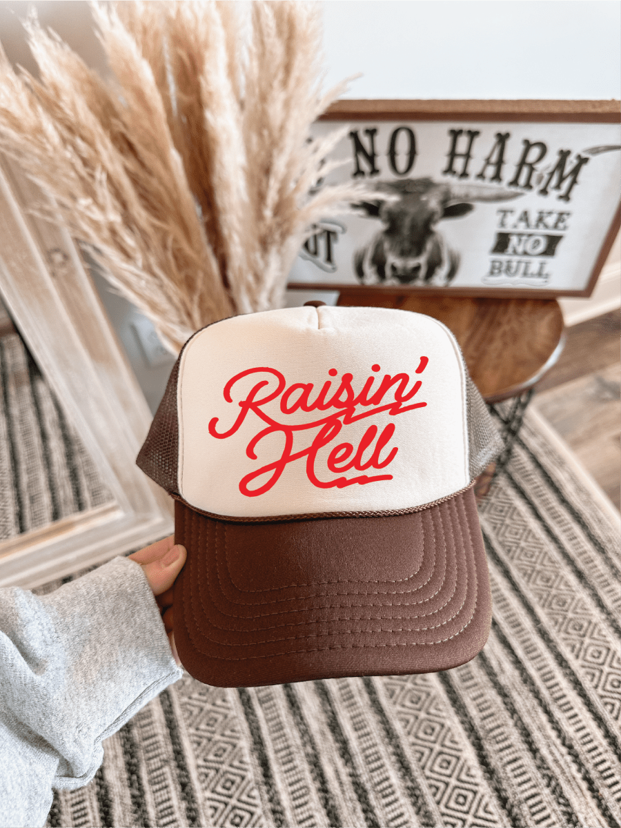 Raisin Hell DTF on a Brown and Tan Hat - S. M. & Co.