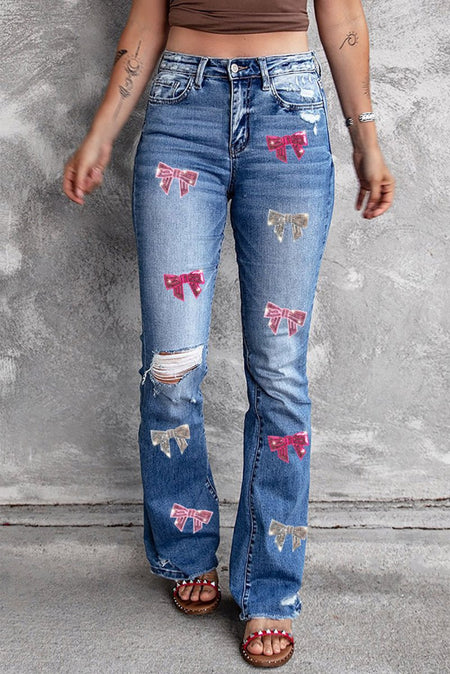 Sequin Bow Distressed Bootcut Jeans - S. M. & Co.