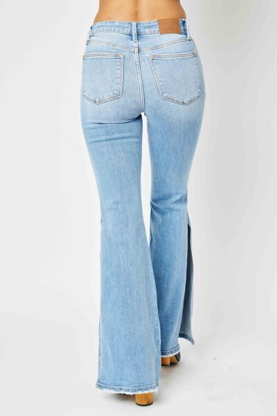 Judy Blue Full Size Mid Rise Raw Hem Slit Flare Jeans - S. M. & Co. Women's Jeans